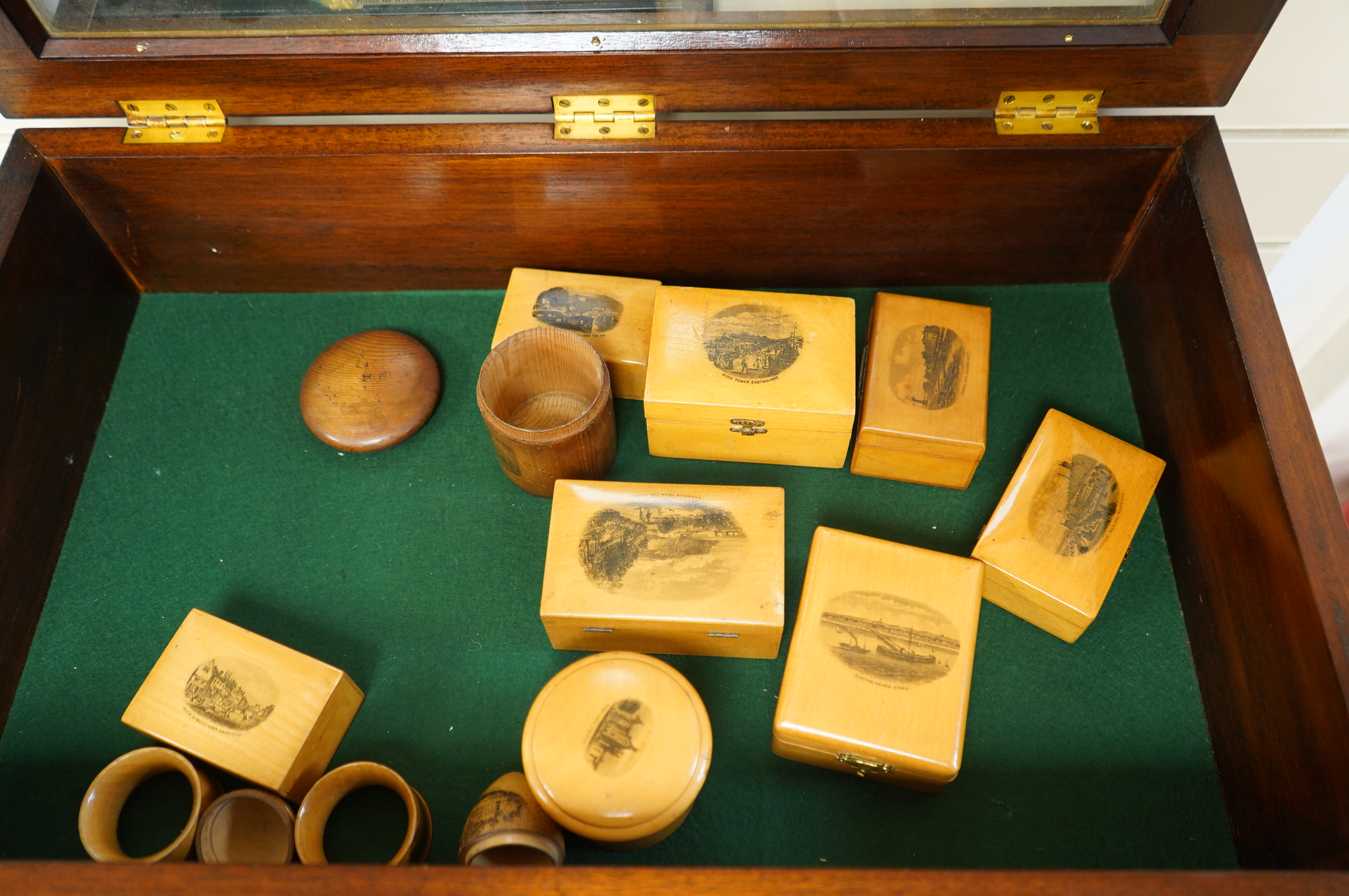 A mahogany display cabinet, with twelve Mauchlineware boxes etc. cabinet 52cm high